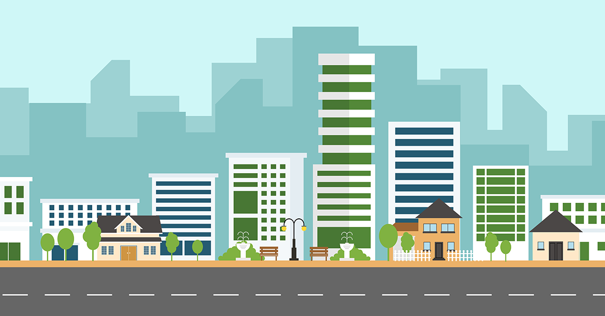 Cityscape showing commercial and residential buildings.